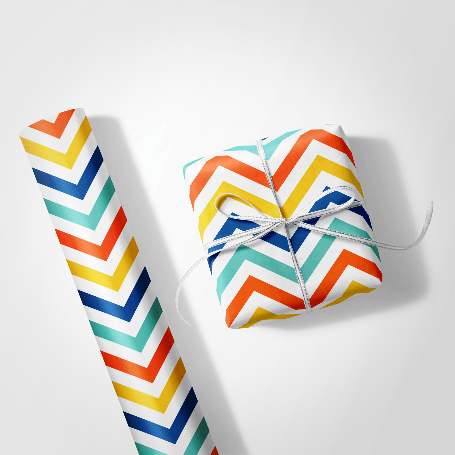 Colorful zigzag-patterned gift wrap on a white background