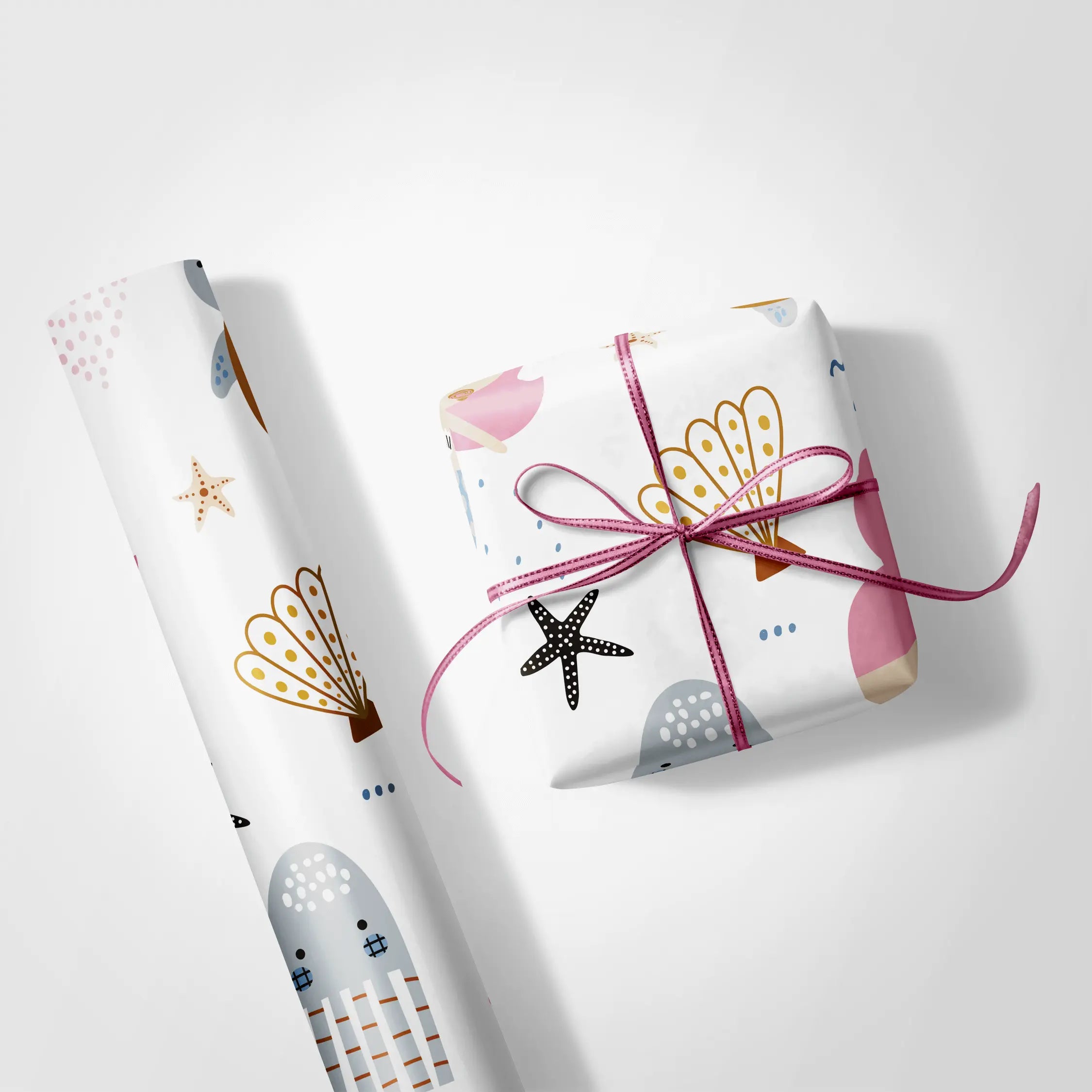 Alt Tag: Mermaid Birthday Wrapping Paper Sea Princess pastel mermaid gift wrap with starfish and sea creature pattern, wrapped present