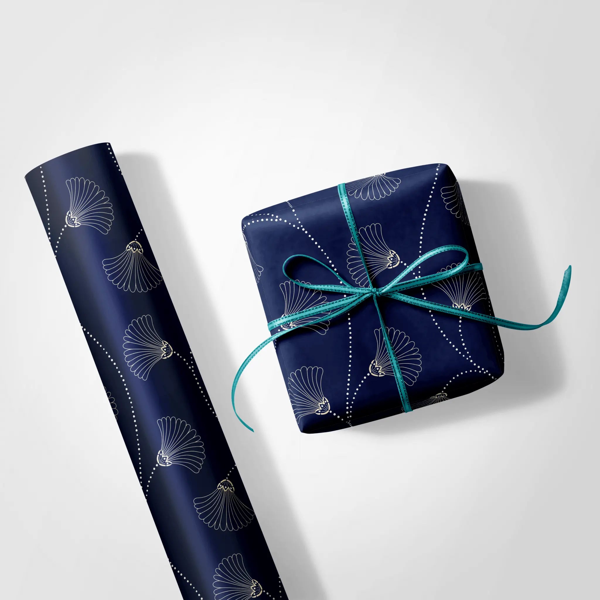 Haus of Wrap Navy Flourish wrapping paper showcases a white fan pattern—perfect gift wrap for weddings, birthdays, or holidays.