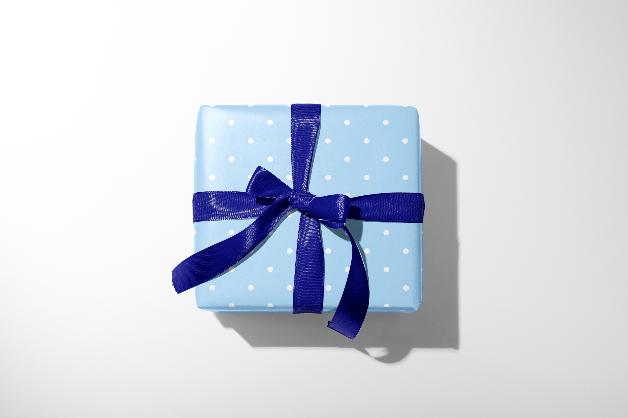 Blue gift box with a blue ribbon on a white background