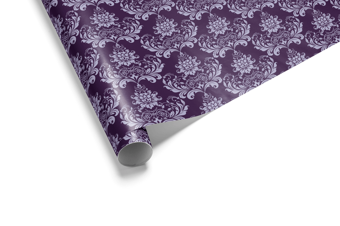 Monochromatic purple wrapping paper with a dense, repeating Damask motif in two shades of purple, conveying a sense of luxury and formal gift wrap.