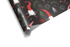 Black Christmas wrapping paper with a dense pattern of whimsical red-hatted gnomes, green pine, and white snowflakes.