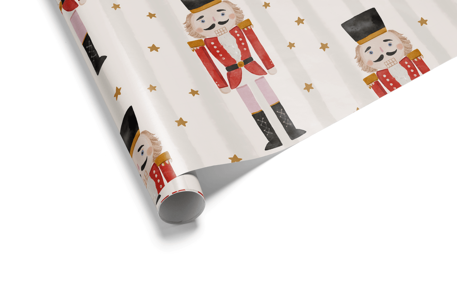 White Christmas wrapping paper with faint stripes, featuring a watercolor pattern of Nutcracker figures in red and black, along with scattered gold stars.