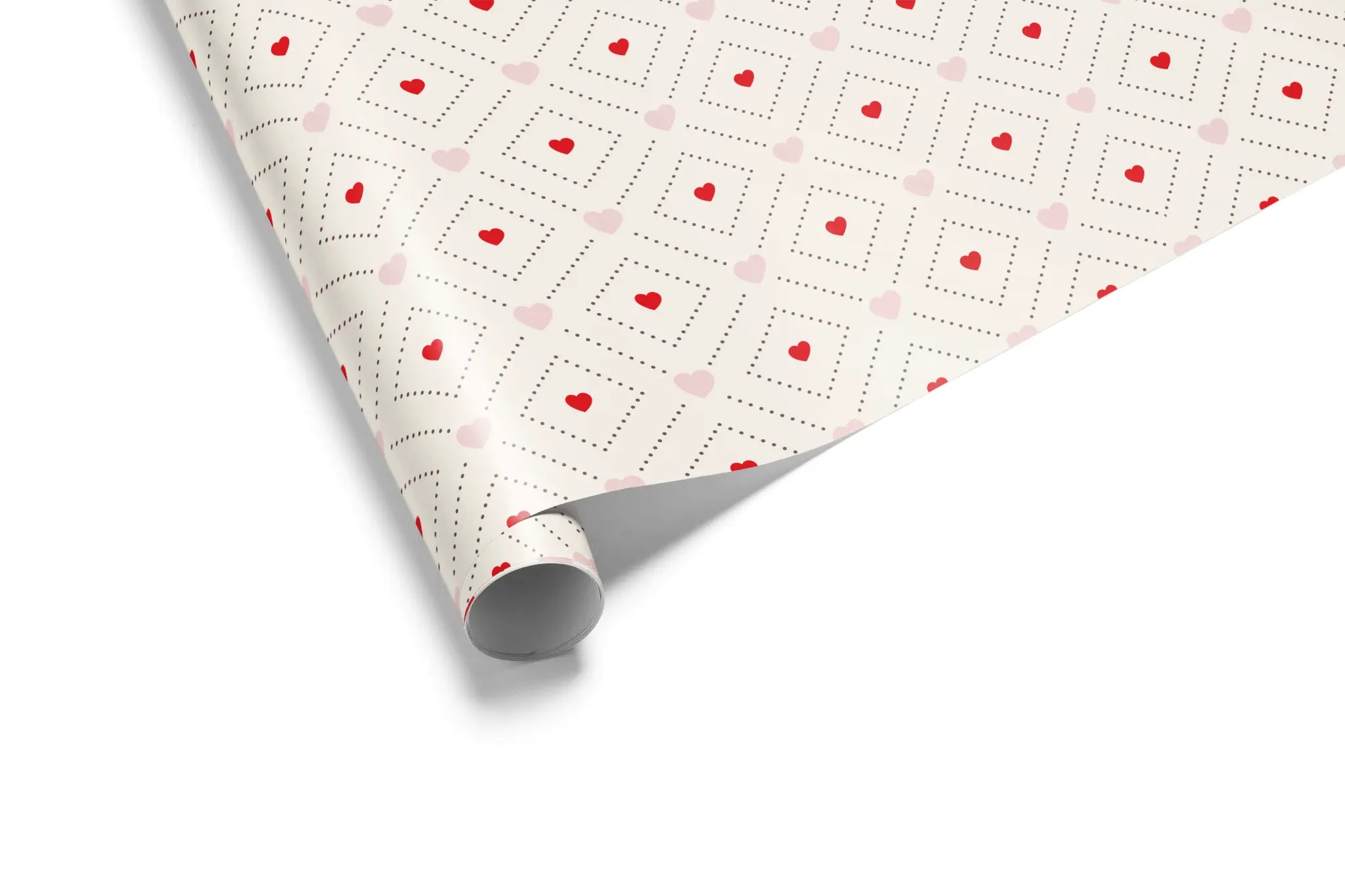 Haus of Wrap’s Tender Geometry gift wrap: chic red hearts, pink dots on white—perfect for birthdays, weddings, or holiday wrapping.