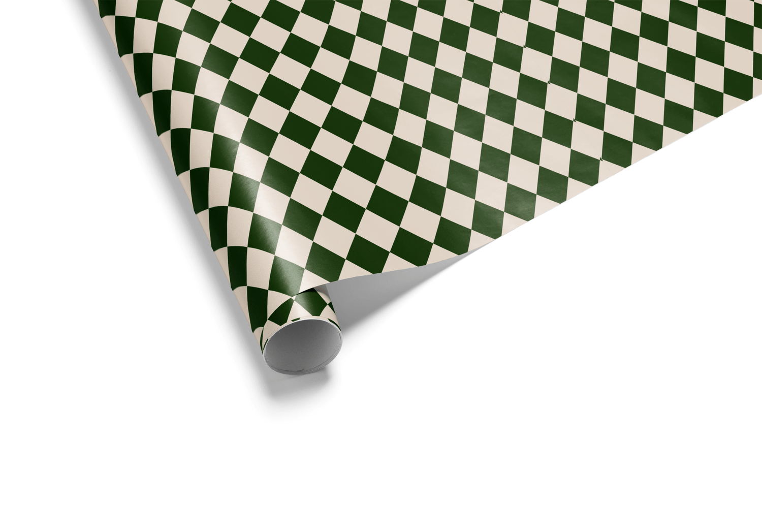 Diamond checkerboard wrapping paper (Harlequin pattern) in high-contrast deep forest green and light cream, ideal for mens wrapping paper and geometric wrapping paper.