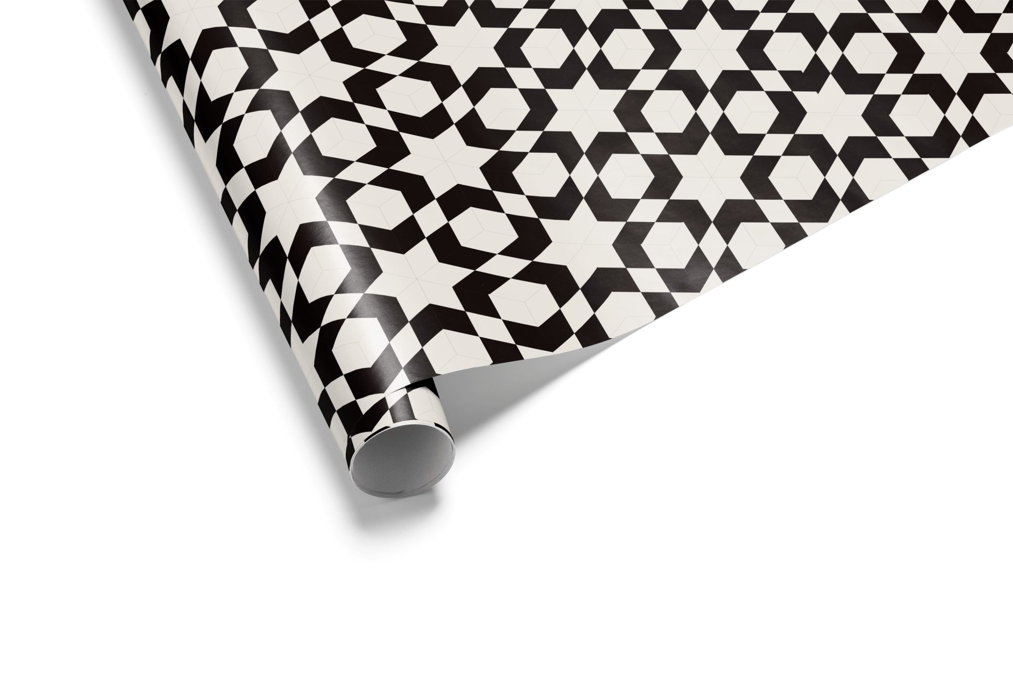 Dense geometric wrapping paper with a black and white pattern of interlocking octagons and stars, creating an intricate lattice for luxury gift wrap.