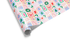 Christmas wrapping paper with colorful holiday stamps featuring trees, stockings, holly, and bows.