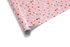 Pink Christmas wrapping paper with red, green, and white polka dots for holiday gifts.