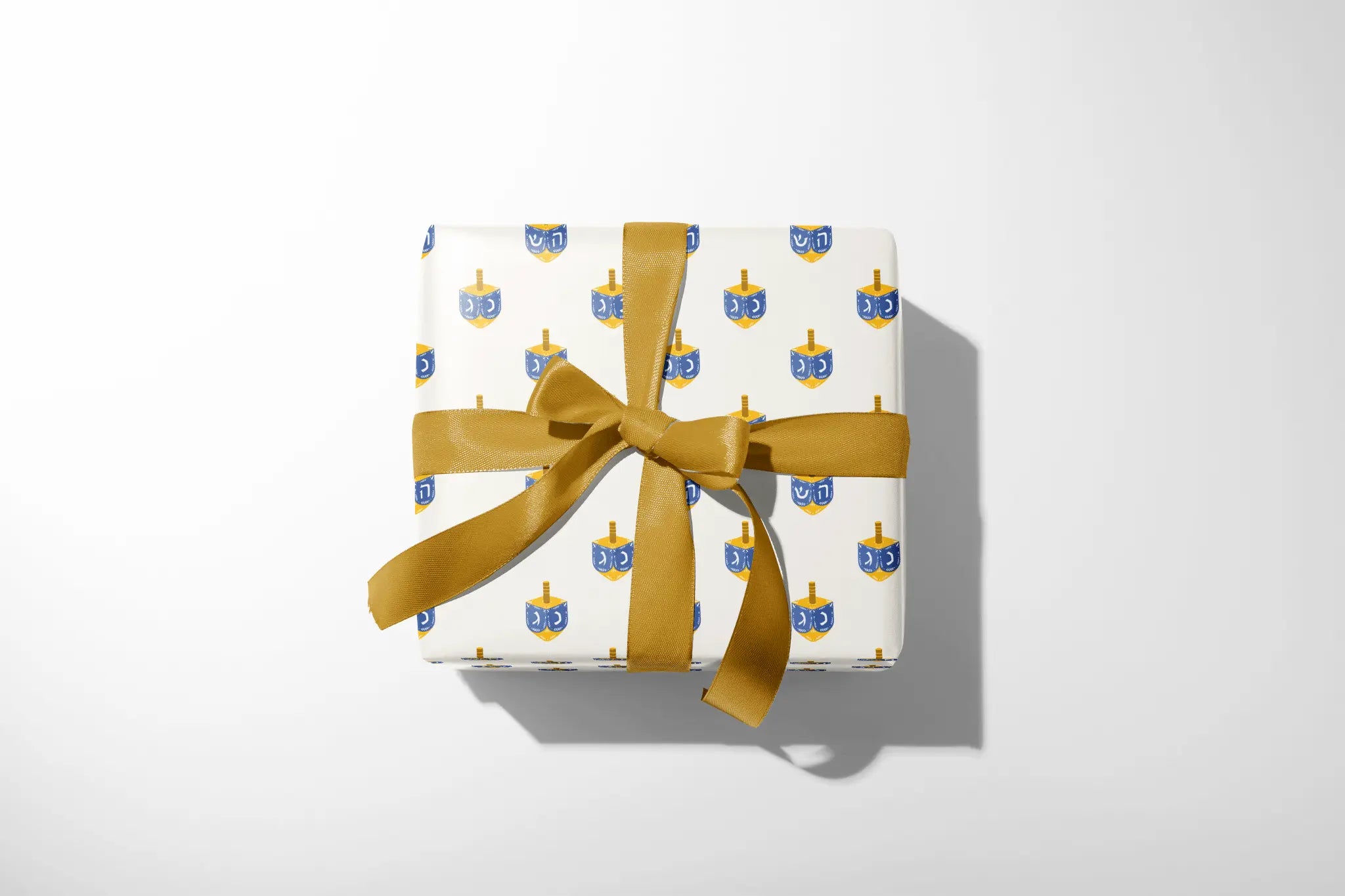 focus_keyword - The Dreidel Spin - Haus of Wrap