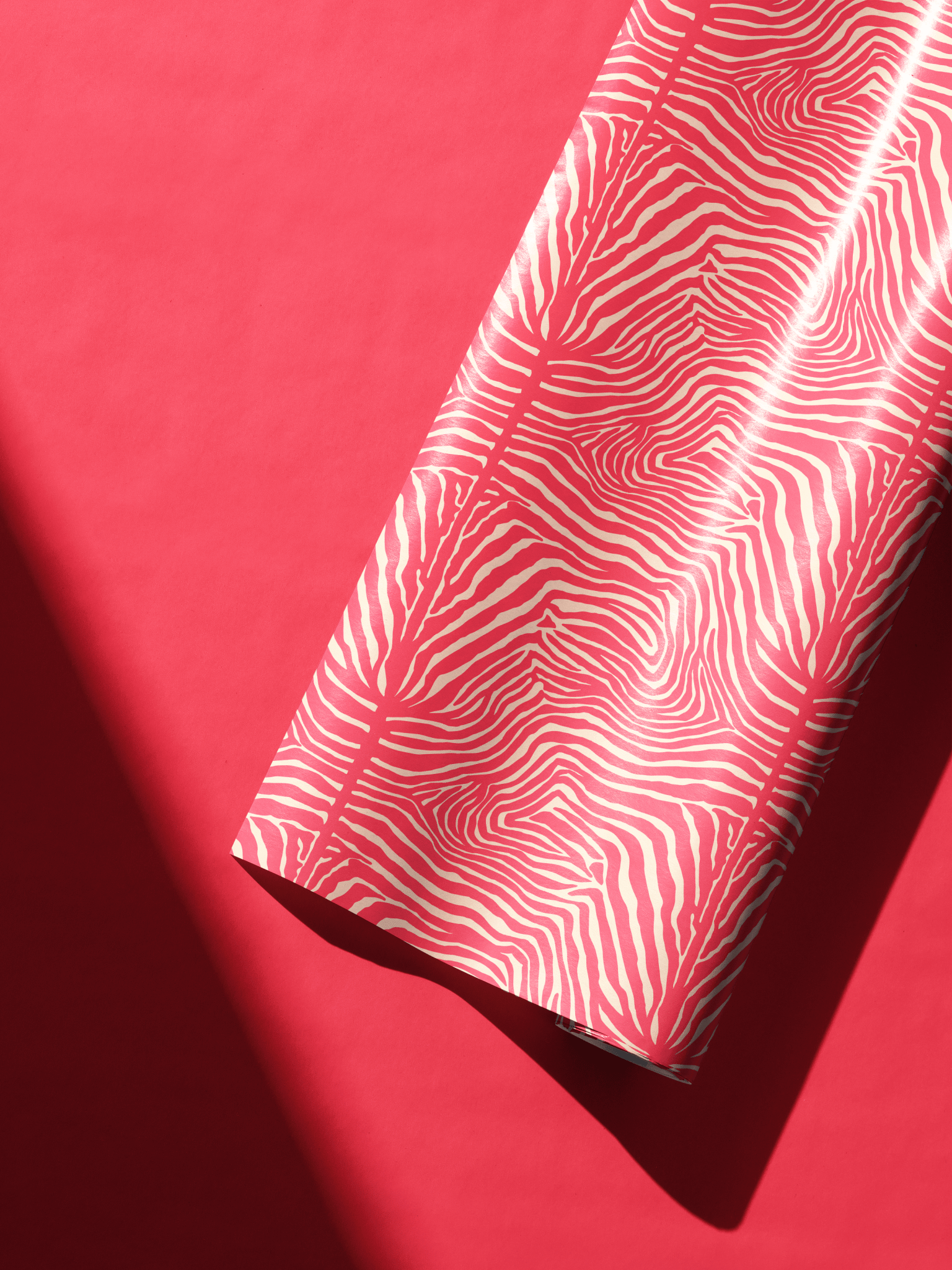 Pink and cream zebra print wrapping paper, ideal for a 21st birthday wrapping paper for her.