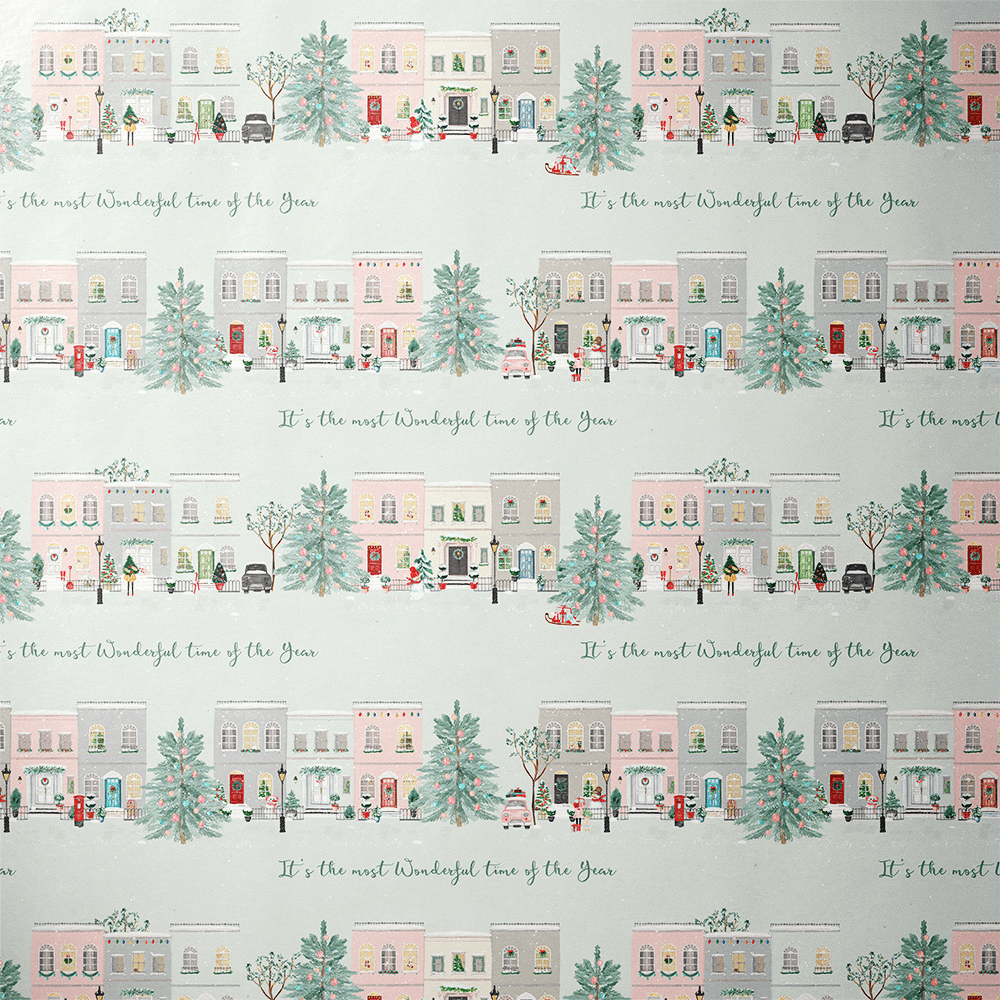 Close-up of the ribbon bow on a gift wrapped in mint christmas wrapping paper