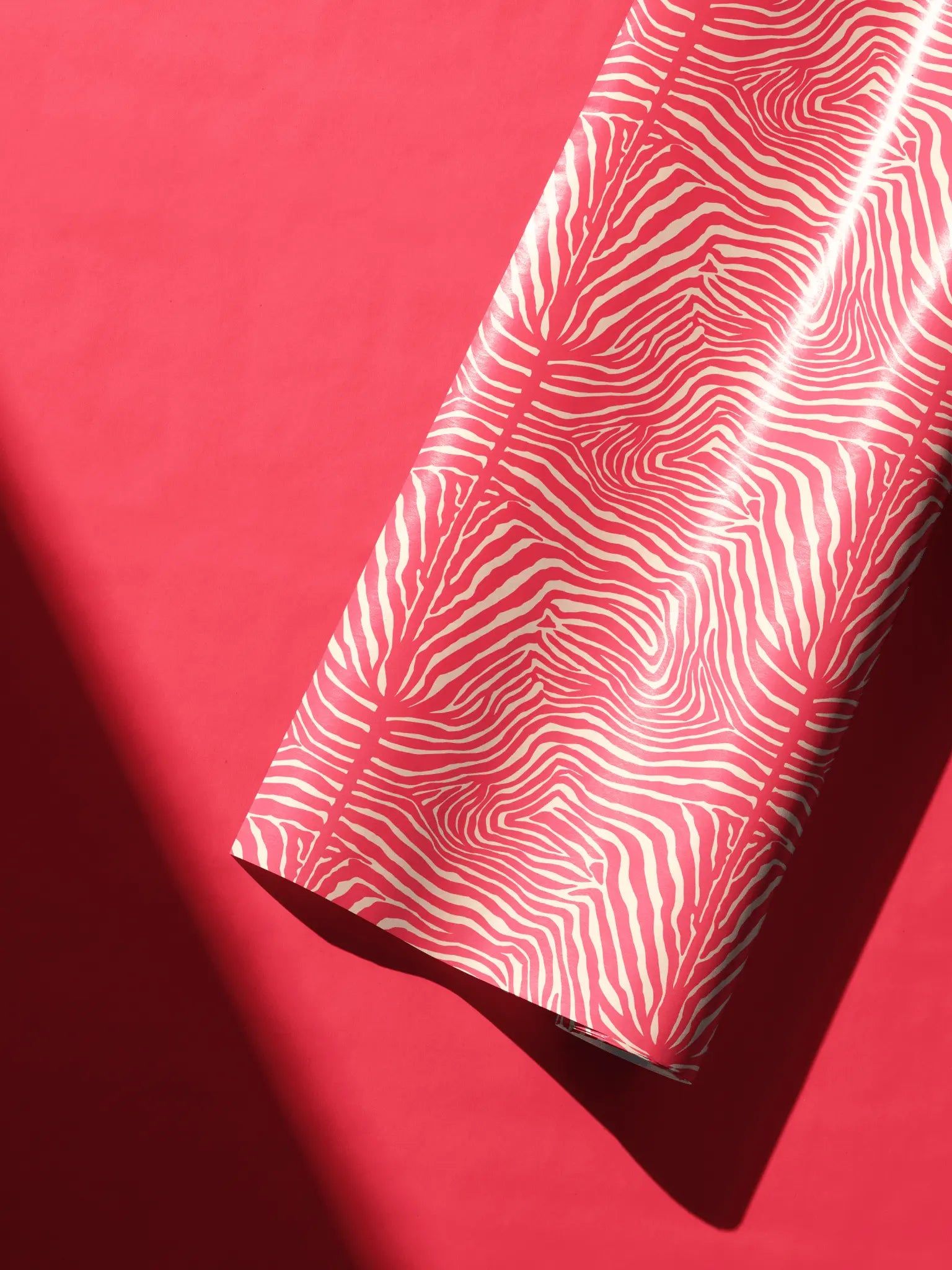 Alt Tag: Pink Animal Print Birthday Wrapping Paper in vibrant pink zebra stripes on cream, Petal Zebra Luxe gift wrap roll