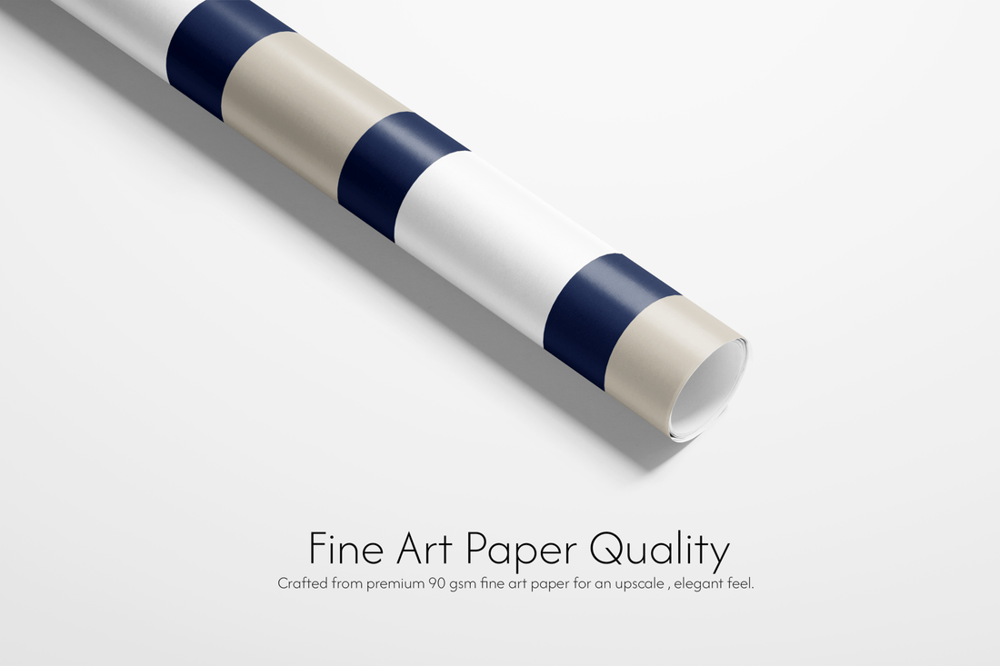 Roll of fine art paper with blue and white stripes on a light gray background