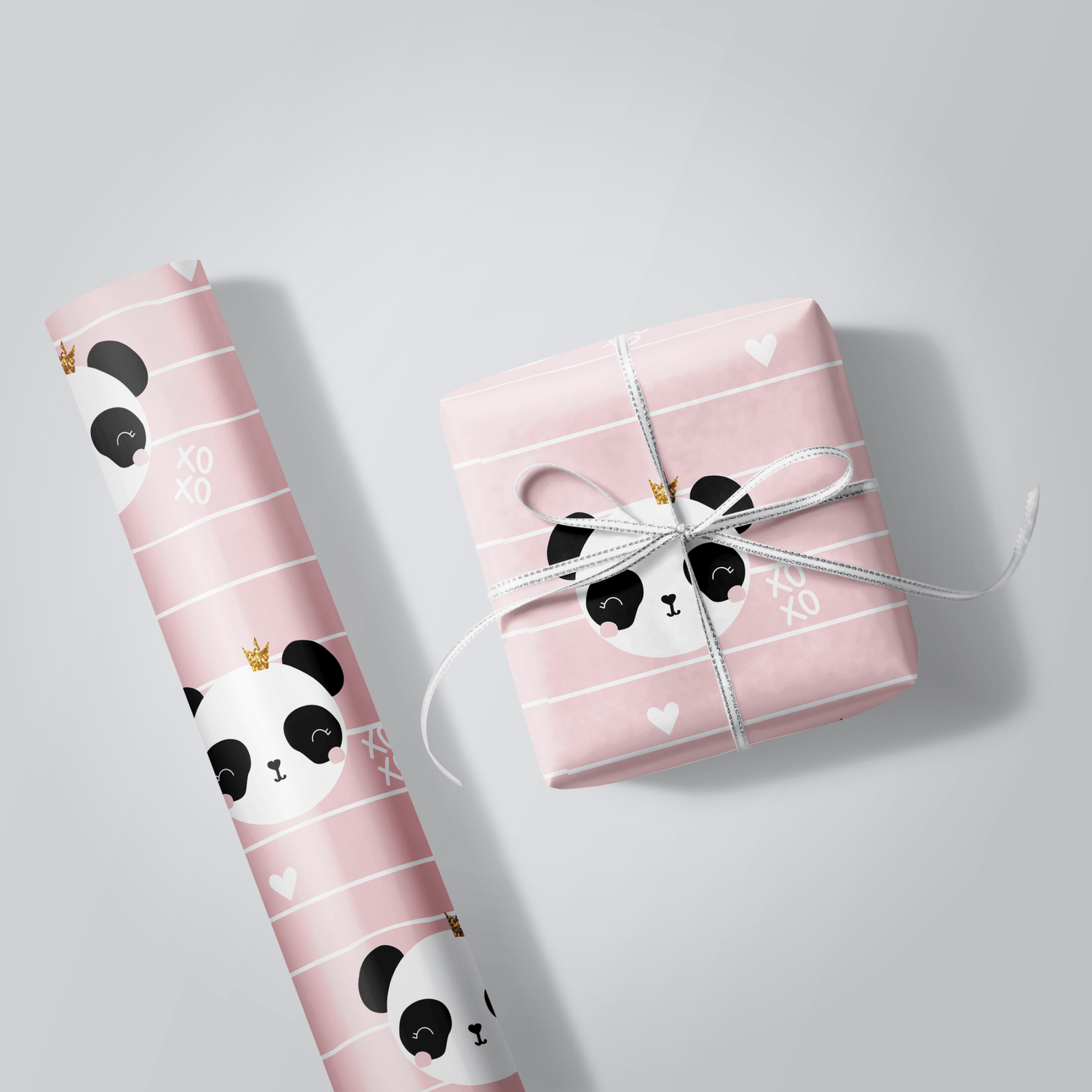 Pink panda-themed gift wrap with a wrapped present on a light gray background
