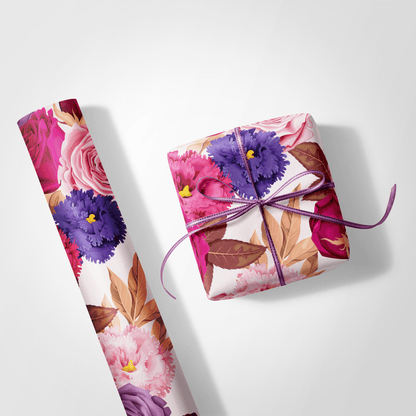 Floral gift wrap with a wrapped present on a white background