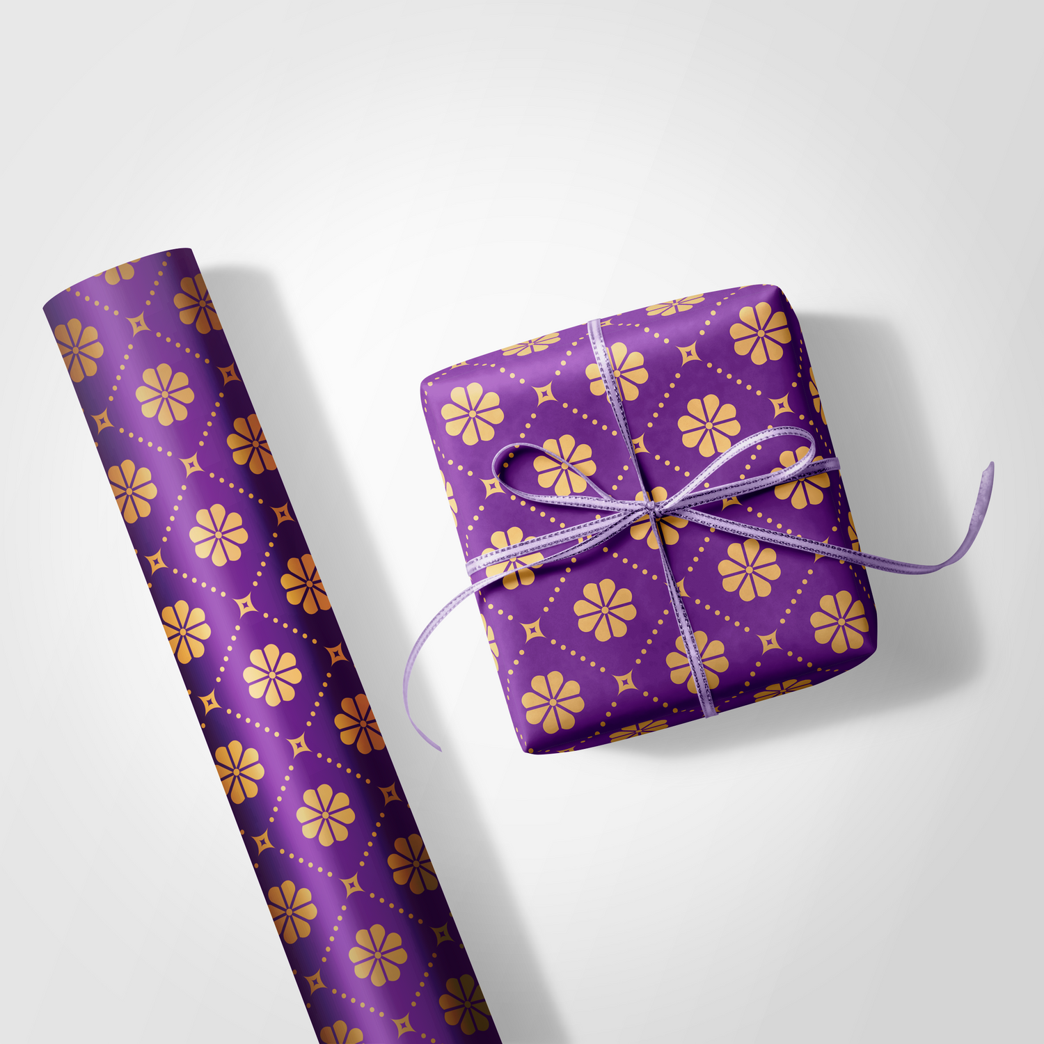 Purple gift wrap with yellow floral pattern and a tied bow on a white background