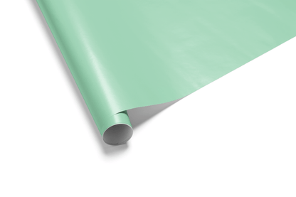 Solid mint green wrapping paper swatch, ideal for solid color wrapping paper and creating a calm, foundational look for gifts.