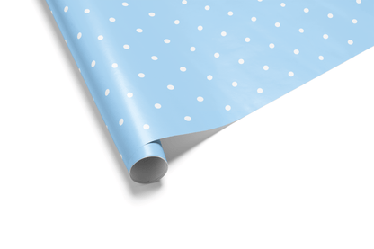 Solid light blue wrapping paper with a uniform pattern of white polka dots, ideal for baby boy wrapping paper and classic, simple gifts.


