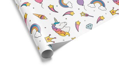 White wrapping paper with a scattered pattern of colorful cartoon unicorns, rainbows, crowns, ice cream cones, and wands, ideal for unicorn birthday wrapping paper.