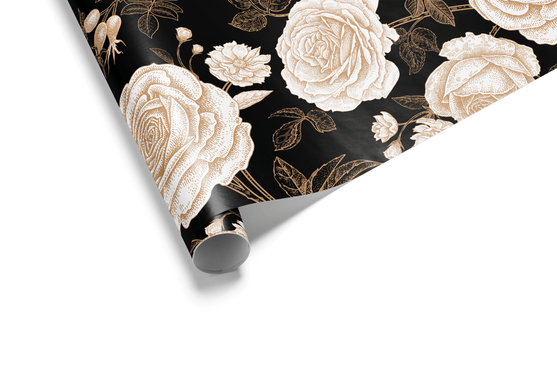 Solid black wrapping paper with a dense, detailed pattern of large roses and vines rendered in a high-contrast creamy gold/white, ideal for black and gold luxury floral wrapping paper.