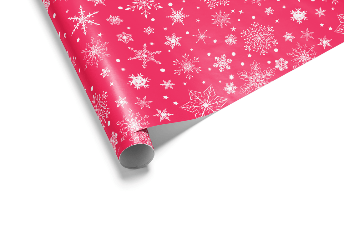 Vibrant fuchsia pink wrapping paper with a dense, scattered pattern of various white snowflakes, ideal for girly Christmas wrapping paper and bold holiday themes.