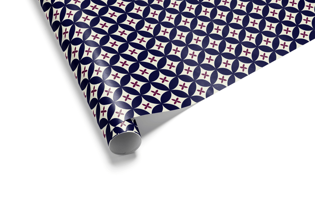 Dense navy blue wrapping paper with an intricate geometric micro-pattern of tiny white interlocking stars and circles, ideal for luxury gift wrap and geometric wrapping paper.