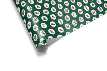 Dense dark green wrapping paper with white ovals containing small holiday icons like teddy bears and snowmen, creating a preppy Christmas aesthetic.