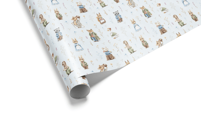 White wrapping paper with a watercolor pattern of storybook woodland animals (rabbits, foxes, hedgehogs) and wildflowers, ideal for peter rabbit wrapping paper.