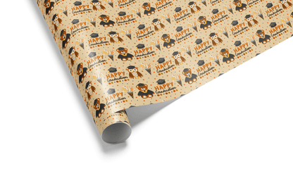 Light tan wrapping paper with a dense pattern of figures wearing graduation caps and gowns, interspersed with &quot;Happy Graduation&quot; text, ideal for graduation wrapping paper