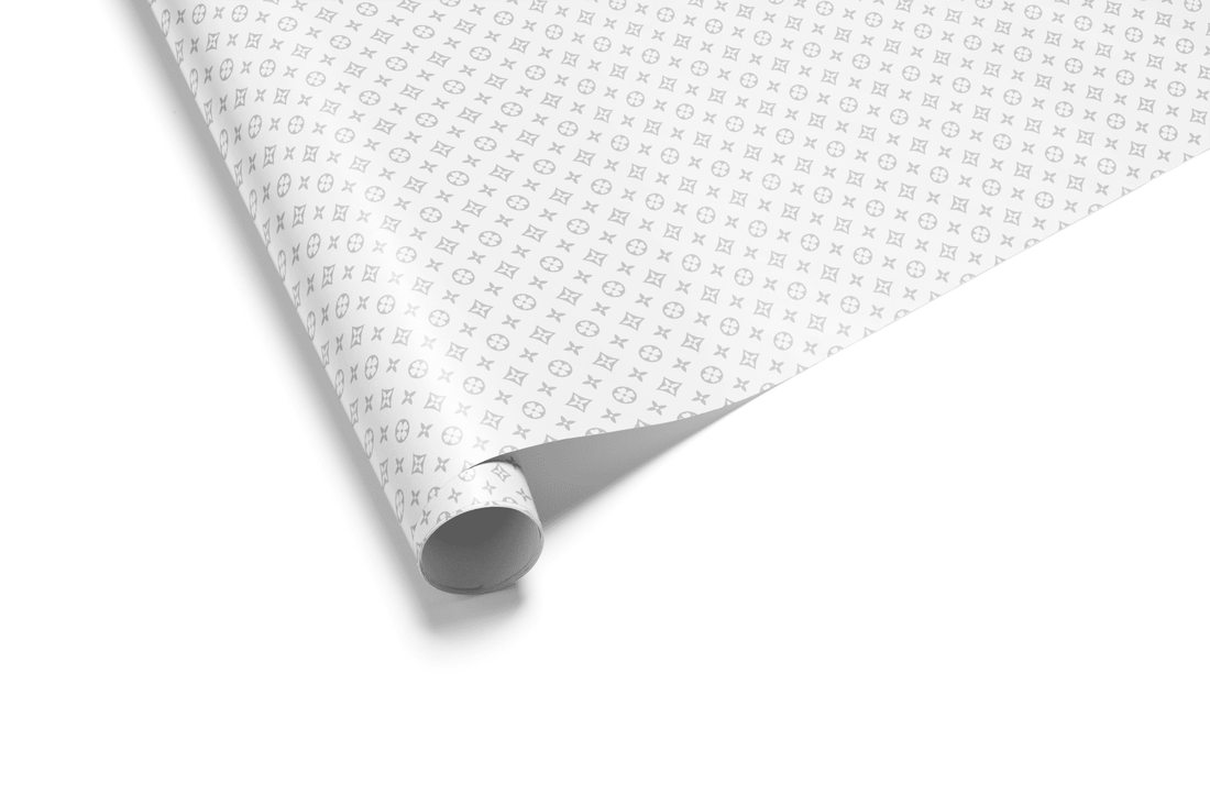 Roll of white paper with a subtle pattern on a white background