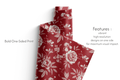 Red floral wrapping paper with white flowers on a white background
