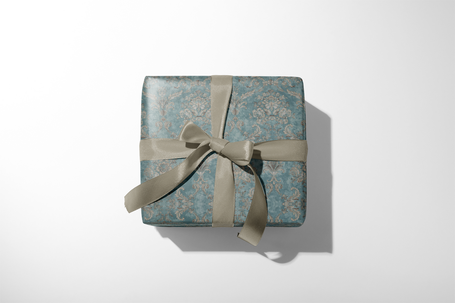 Victorian Gift Wrap in antique teal with ornate damask baroque pattern on gift box, tied with taupe satin ribbon