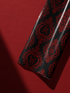 Alt Tag: Gothic Gift Wrap in deep black with crimson damask hearts and ornate rose detailing, Dark Devotion design
