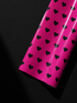 Alt Tag: Pink Heart Wrapping Paper roll in hot pink with black heart pattern, bold modern gift wrap for confident celebrations