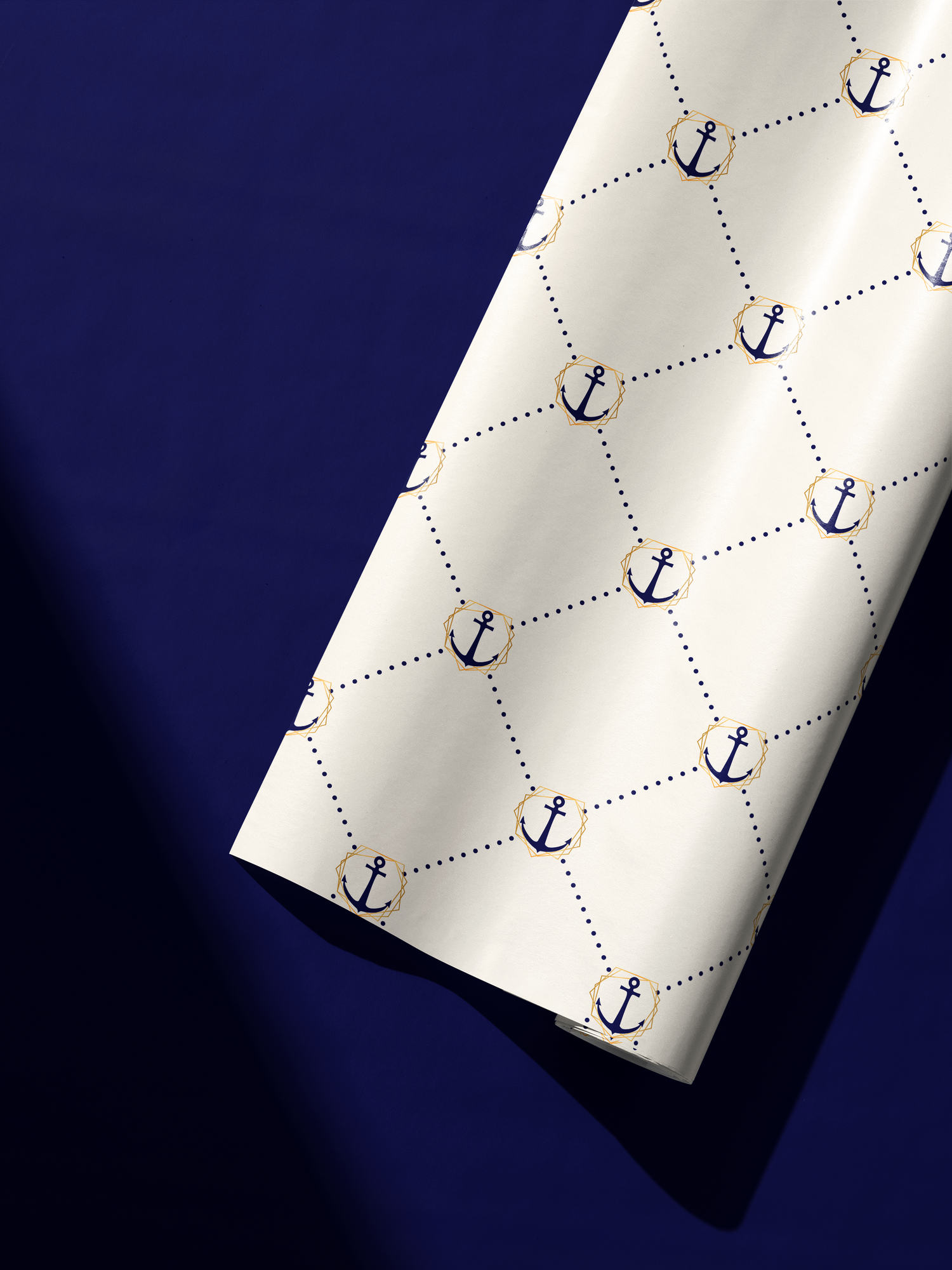Alt Tag: Nautical Wrapping Paper roll with navy anchors, dotted lattice pattern, and soft neutral background on deep navy backdrop