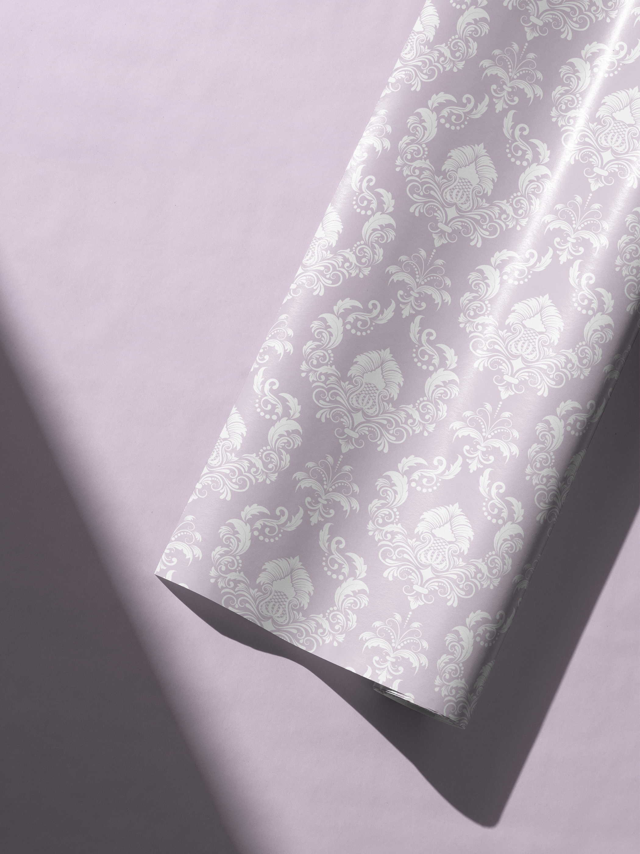 Alt Tag: Quiet Estate lavender damask wrapping paper with white intricate pattern on pale lavender background, elegant gift wrap roll