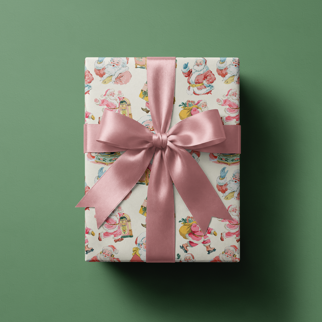 Retro Christmas Wrapping Paper with mid-century Santa print and pink satin bow on gift box, Saint Nick Revival design