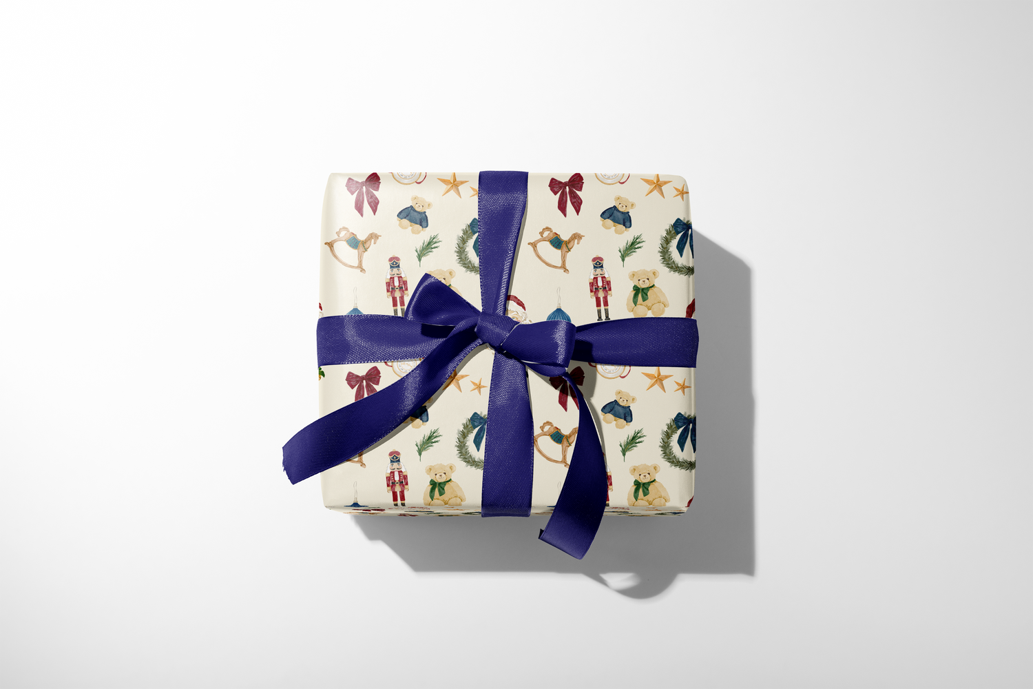 Luxury Christmas Wrapping Paper December Manor gift wrap with Santa nutcracker wreath ornaments gold stars and navy ribbon