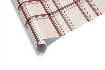 Alt Tag: Christmas Plaid Wrapping Paper roll with red tartan and green stripes on warm cream background, classic holiday gift wrap