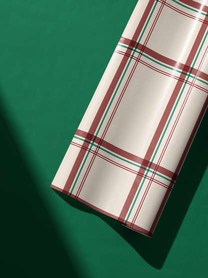 Christmas Plaid Wrapping Paper roll with red and green tartan stripes on cream base, Tartan Registry design