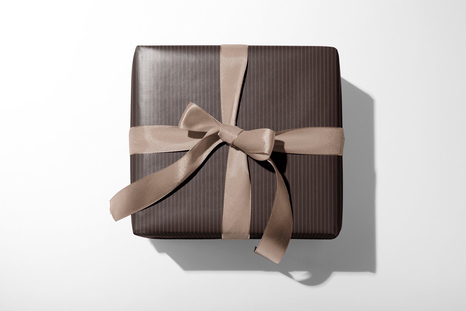 Alt Tag: Brown Striped Wrapping Paper gift wrap in espresso pinstripes with taupe ribbon bow, tailored menswear-inspired look