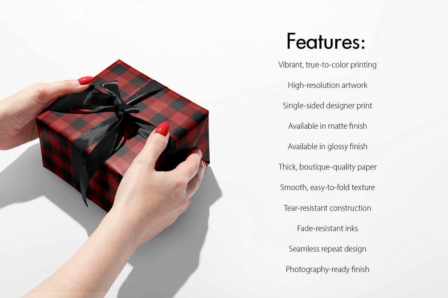 Buffalo Plaid Wrapping Paper winter lodge red and black tartan gift wrap on present with black ribbon, featuring vibrant high-resolution printing