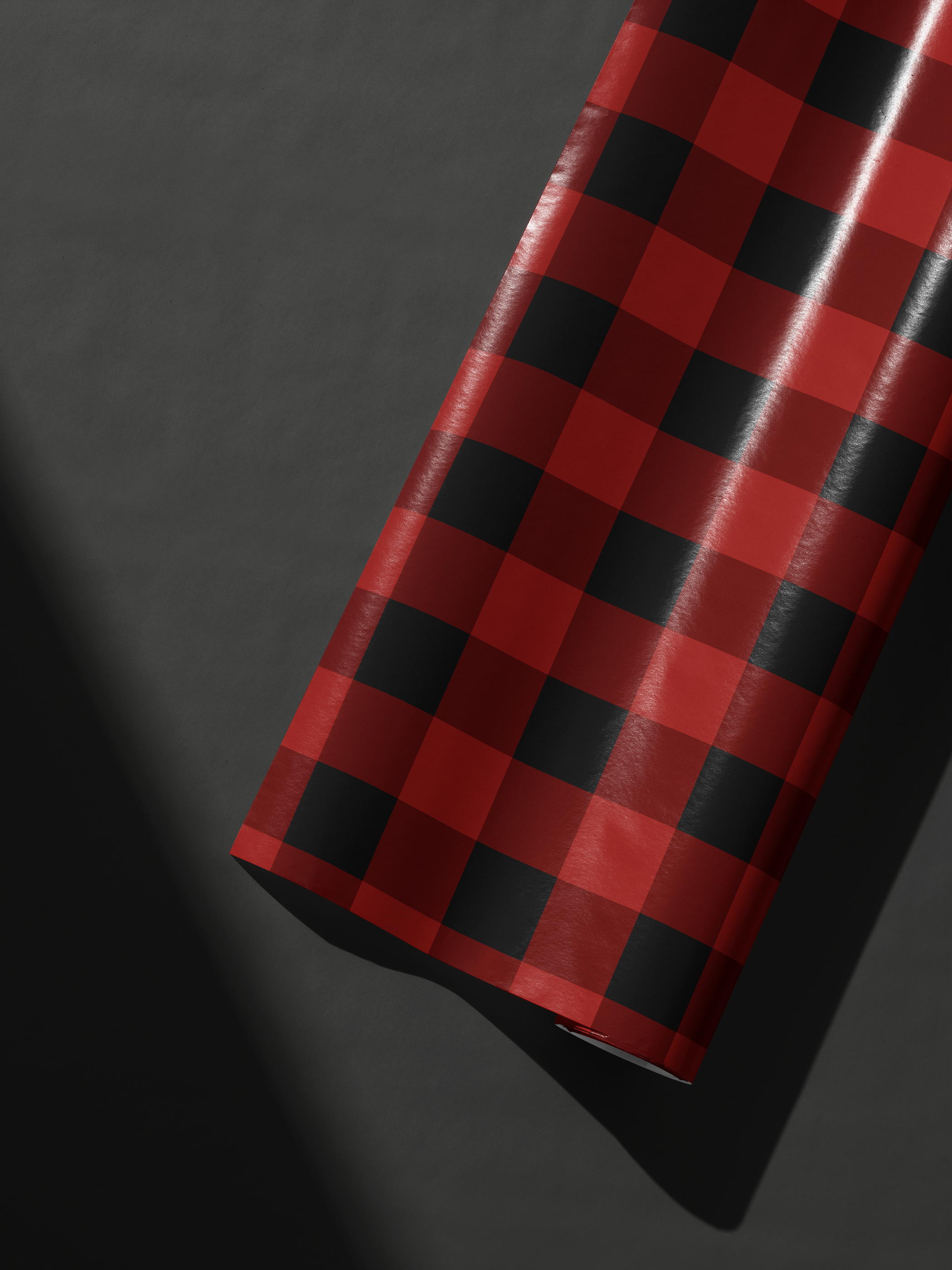 Buffalo Plaid Wrapping Paper roll in red and black tartan check pattern, winter lodge gift wrap