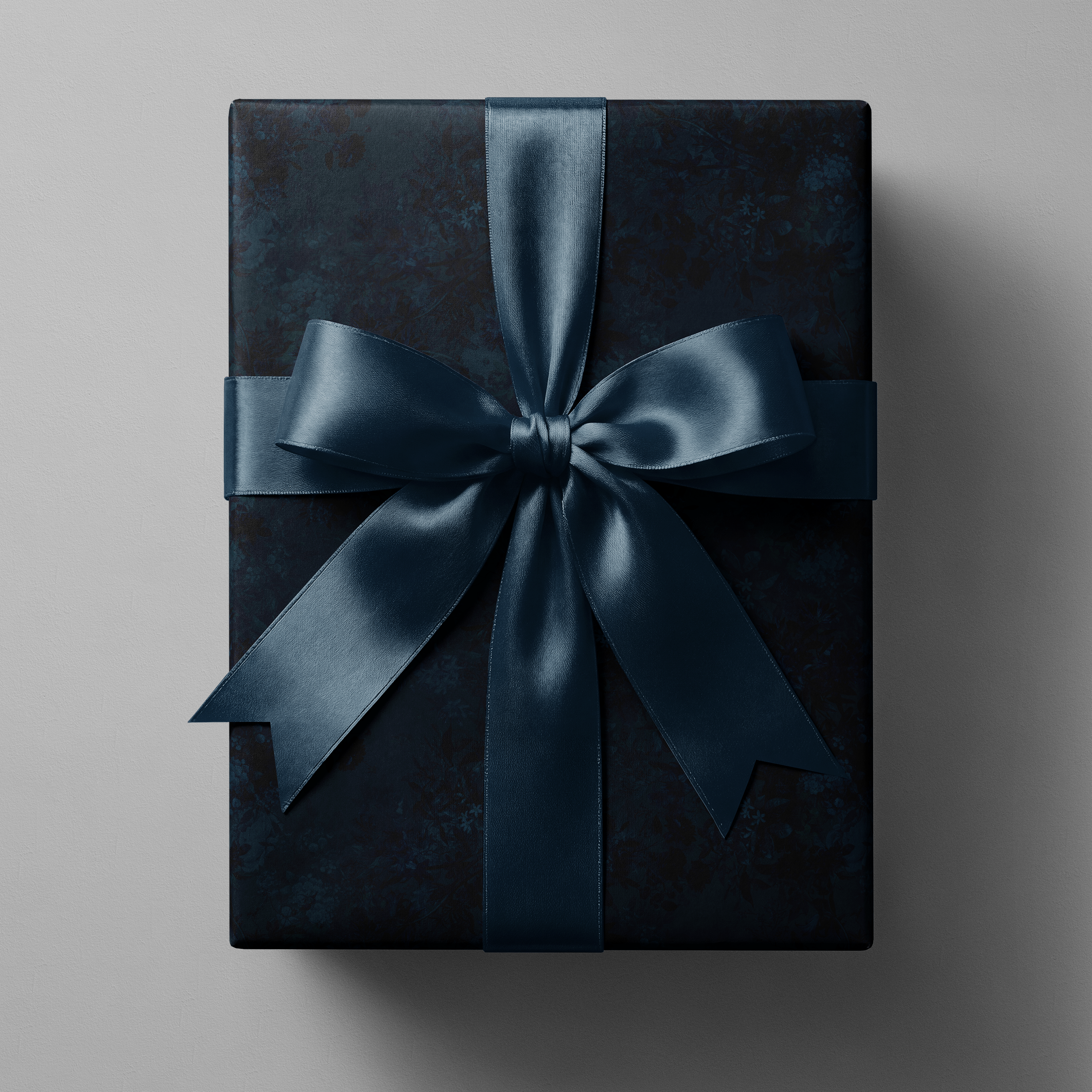 Dark Floral Wrapping Paper Velvet Nocturne gift wrap inky blue with layered navy florals, wrapped present with satin navy bow