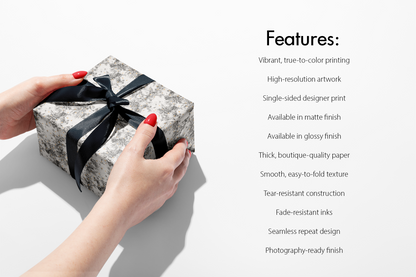 Alt Tag: Black and White Floral Wrapping Paper featuring botanical sketch design with gold speckles, gift box wrap example with ribbon