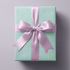 Alt Tag: Fleur de Lis Wrapping Paper on powder blue gift box with pastel fleur-de-lis pattern and lilac satin ribbon bow