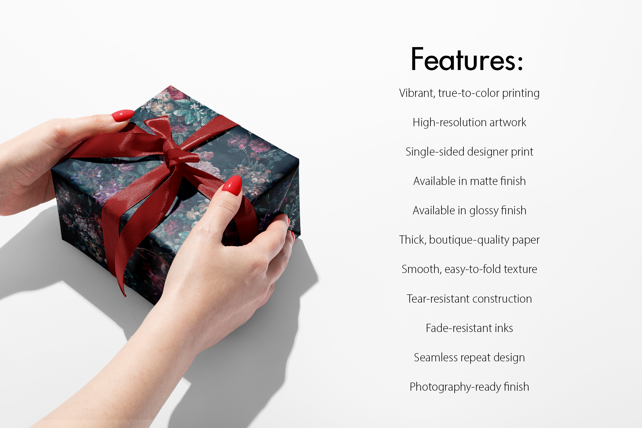 Alt Tag: Moody Floral Christmas Wrapping Paper gift wrap on box with red ribbon, dark jewel-toned florals, boutique-quality features list