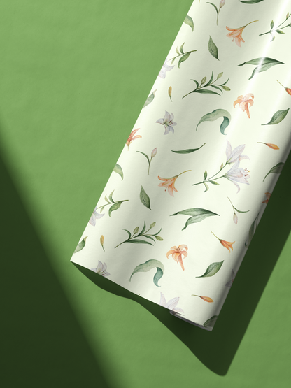 Alt Tag: Floral Wrapping Paper Conservatory Bloom with sage background, delicate lilies, peach blossoms, and airy greenery pattern