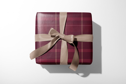 Alt Tag: Burgundy Plaid Wrapping Paper in manor tartan burgundy plaid with fine gold lines, wrapped gift with beige ribbon bow