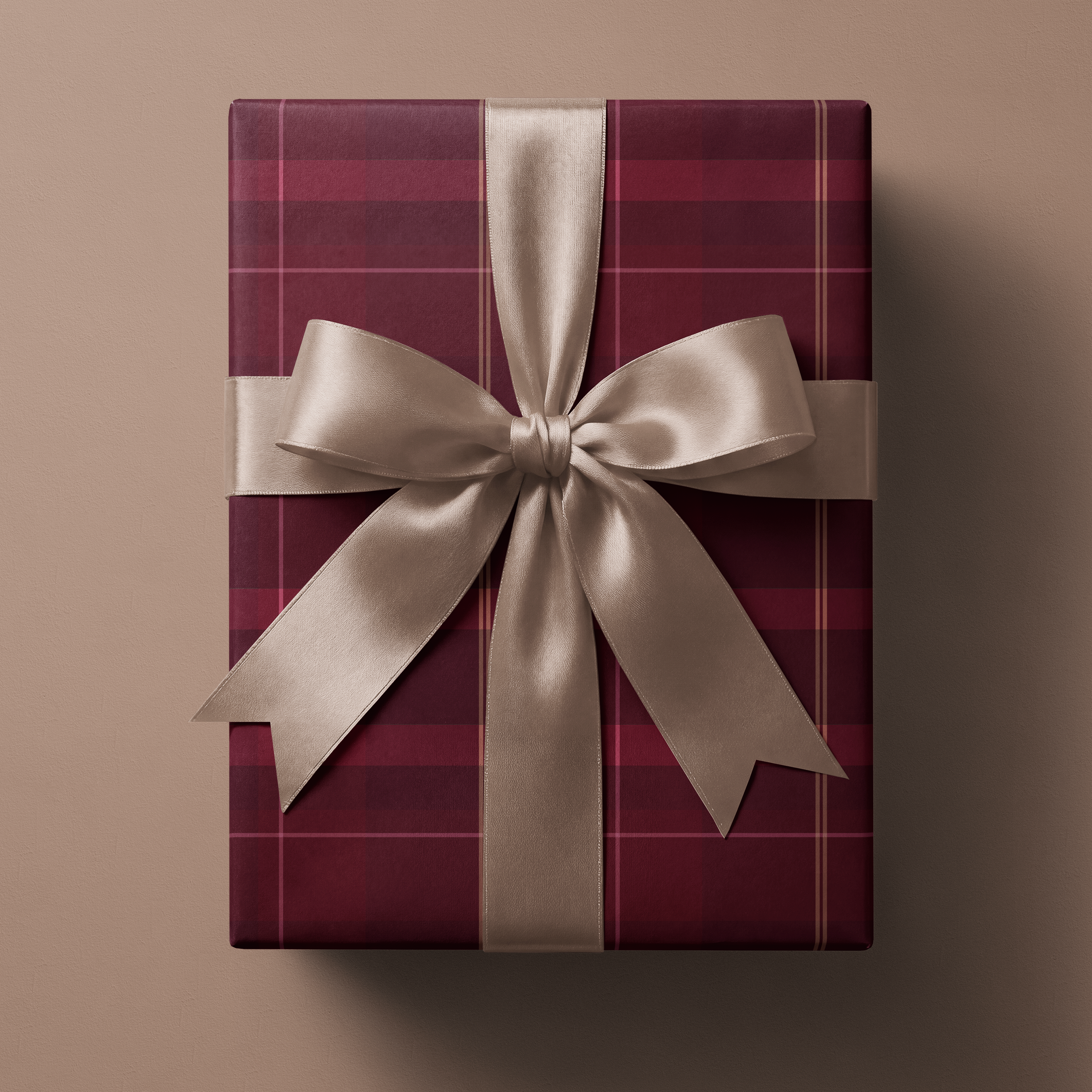 Alt Tag: Burgundy Plaid Wrapping Paper Manor Tartan burgundy tartan gift wrap with gold line accents and satin ribbon bow